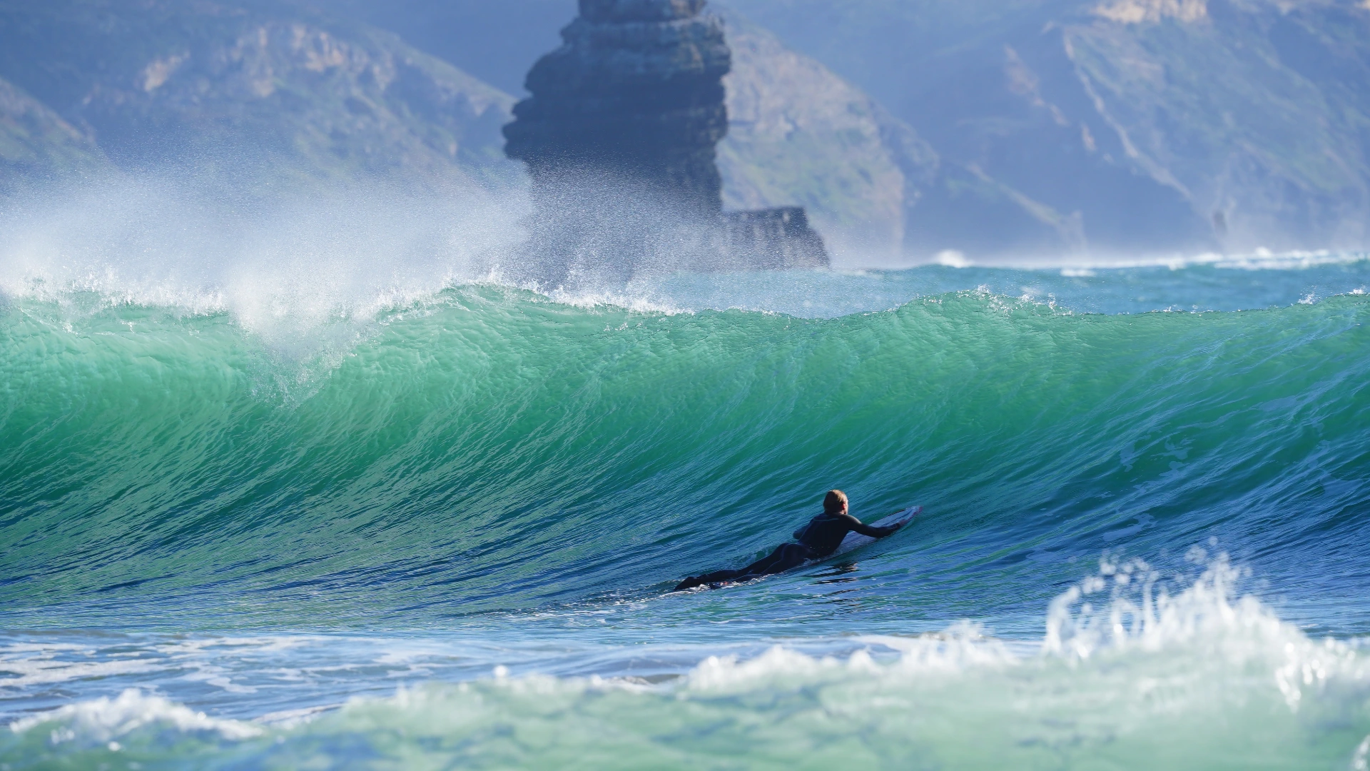 Underwater surf photography inside a turquoise Atlantic wave on Portugal's West Coast